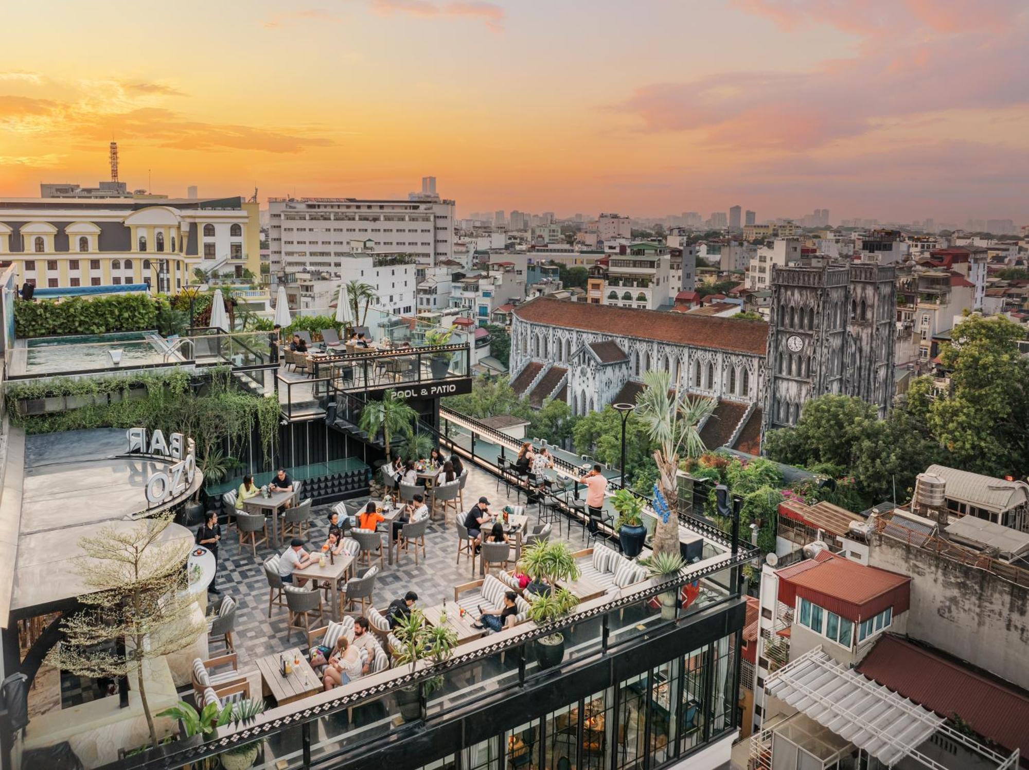 Grand Hotel Du Lac Hanoi Exterior photo View of the rooftop bar